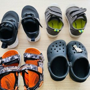 Four pairs of toddler shoes size 5T.